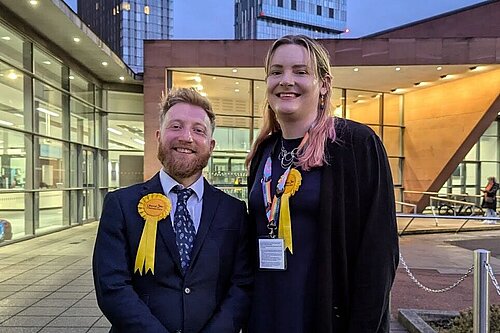 Cllr Alan Good and Cllr Chris Northwood standing outside Manchester Central Convention Complex after the 2024 General Election count